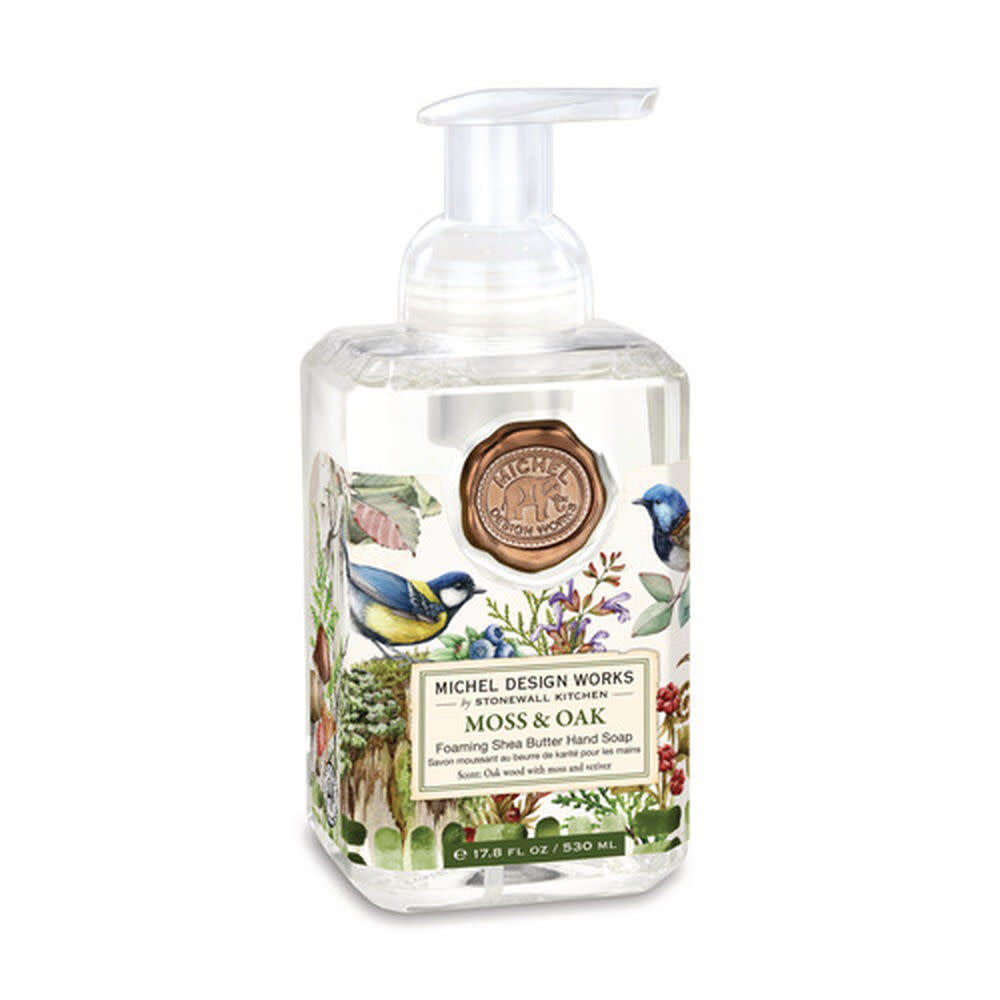 Foaming hand soap dispenser in moss oak finish with a pump top.