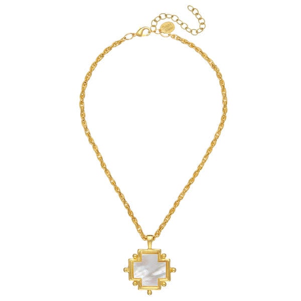 Mother of Pearl cross necklace with hand-cut glistening pendant on a delicate chain.