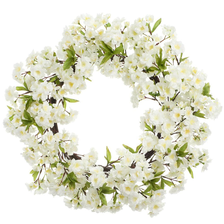 Round cherry blossom wreath with pink floral patterns on a metal wire frame.