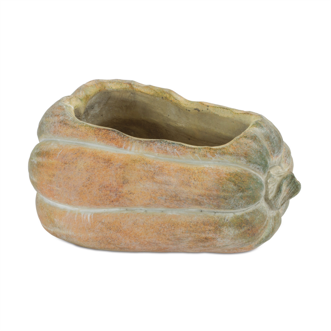 Wide cement pumpkin container in rustic orange and green tones, 8.5 inches long.