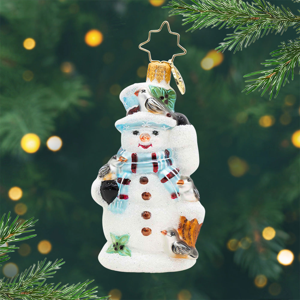Snowy Perch Pals Gem glass snowman ornament with birds, a blue scarf, and a star-shaped hanger.