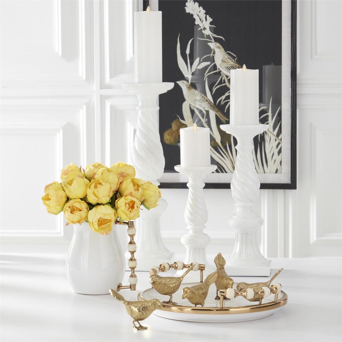Antiqued gold aluminium bird sculpture facing left with a detailed wing pattern.