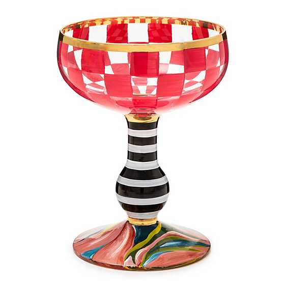 Hand-blown Carnival Coupe glass with colorful swirls in a classic cocktail silhouette.