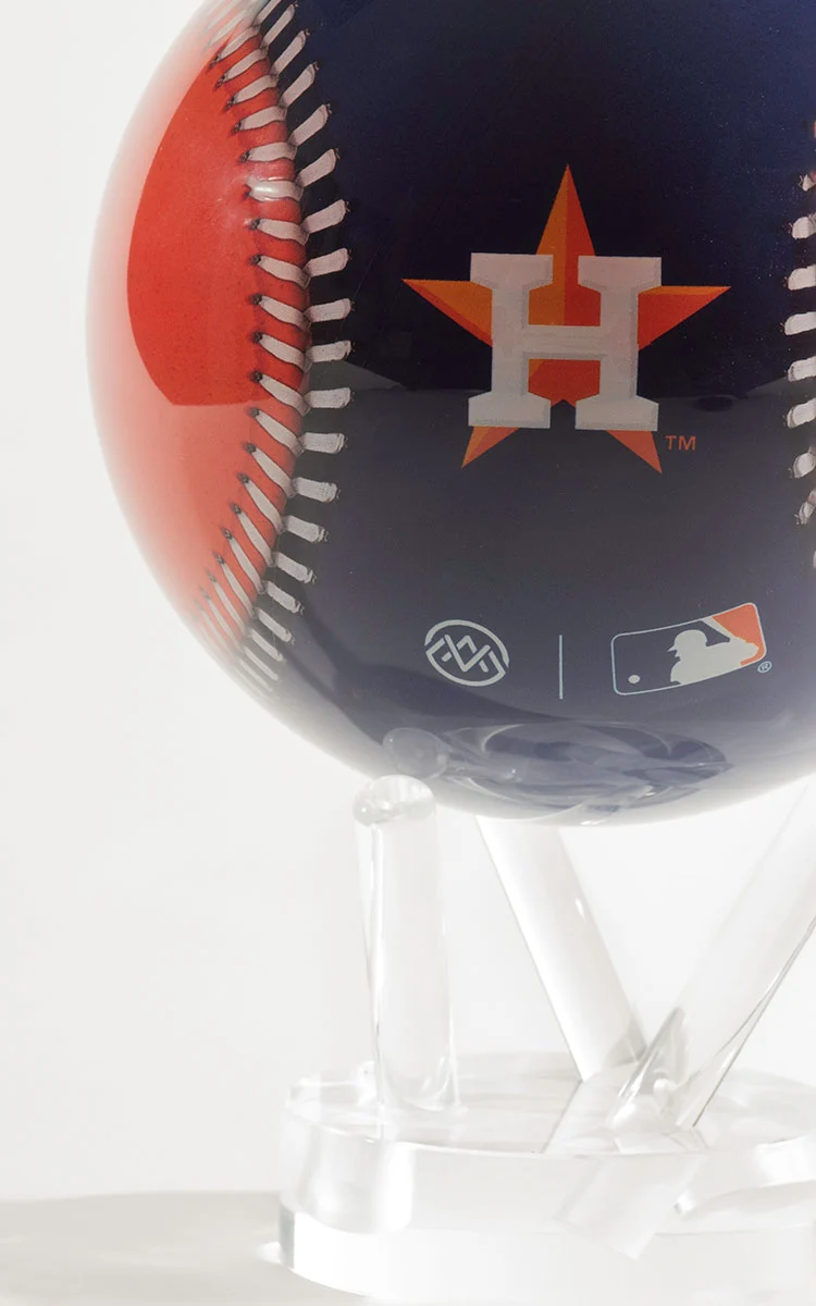 Close-up of a 4.5-inch Houston Astros baseball globe on a clear acrylic tripod stand.