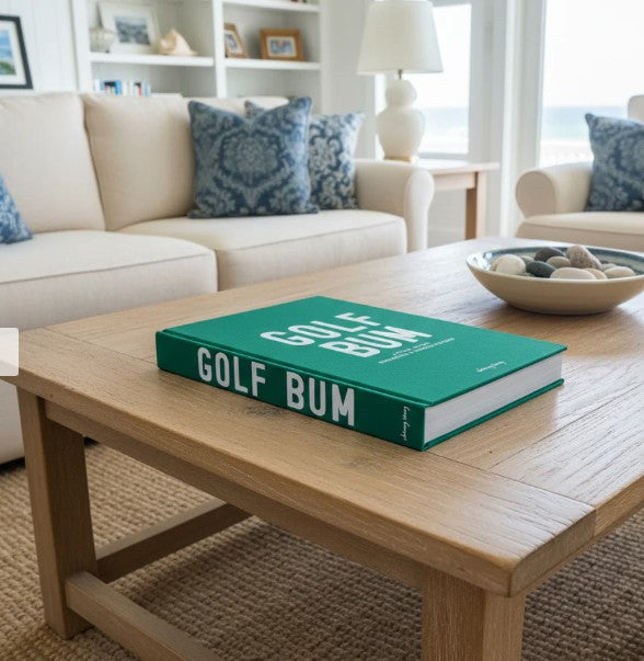Hardcover book 'Golf Bum Book' with cotton fabric cover showing Patrick Koenig's world record journey.