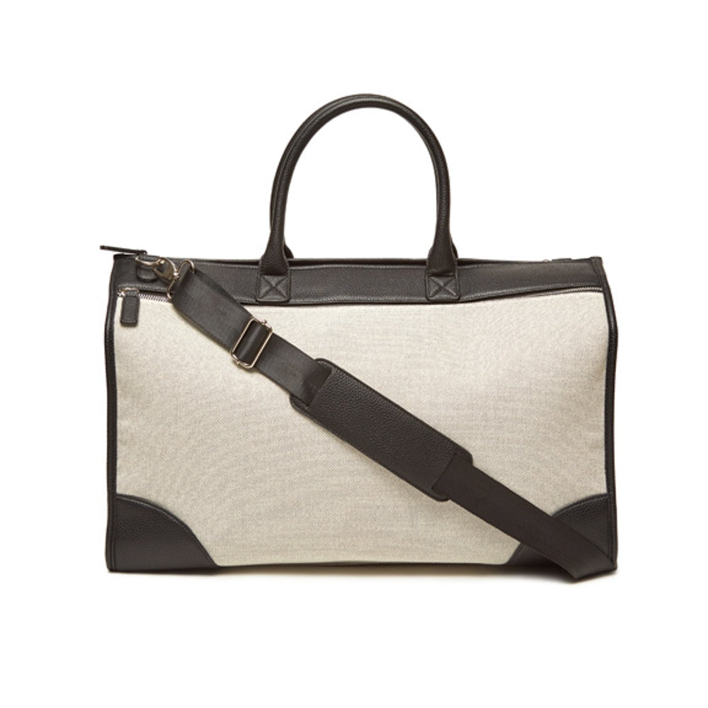 Black Capri boarding bag with structured rectangular silhouette.