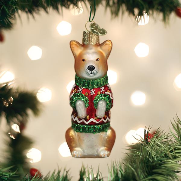 Christmas Corgi ornament featuring a red dog silhouette with white accents on a gold metallic finish.