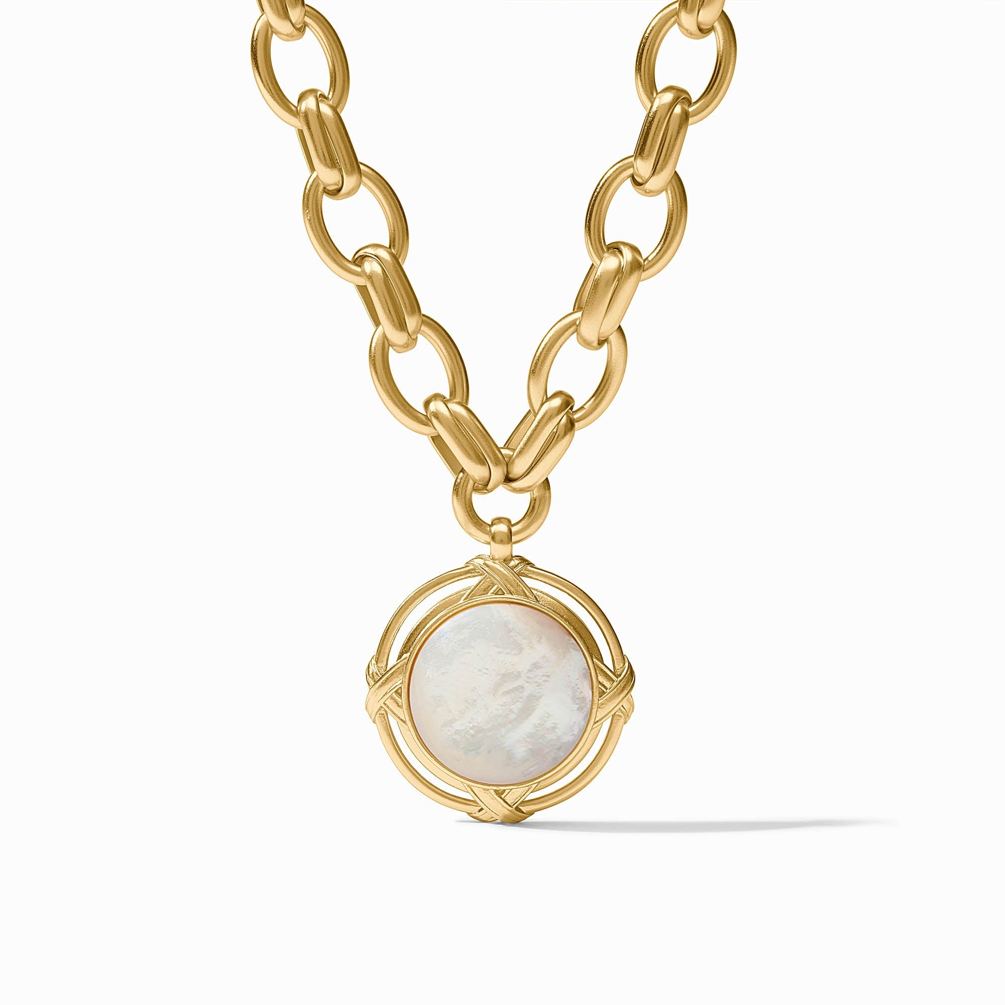 Essex Statement Necklace featuring a gold link chain and a round white mother of pearl pendant.