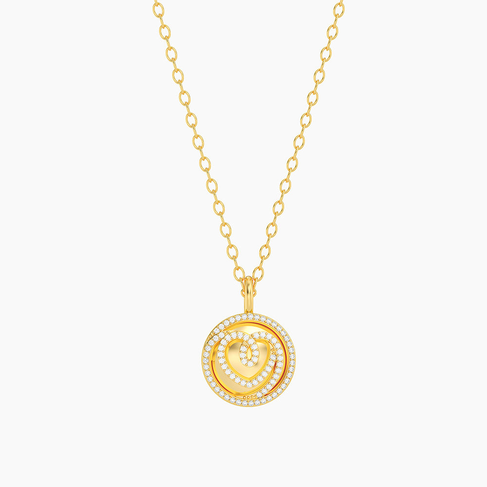 Circle of Love Pendant Necklace in gold with a diamond-encrusted heart and circular border.