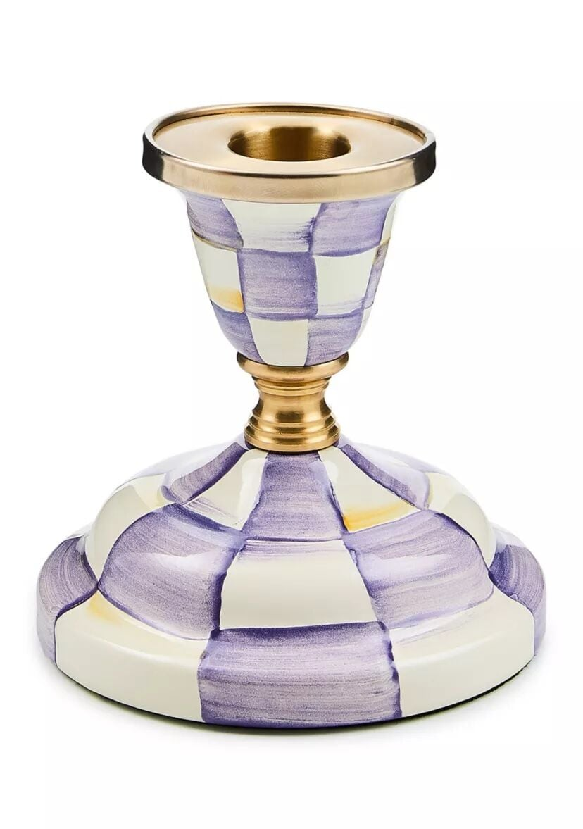 Mackenzie Childs short candlestick with hand-painted purple and white checks and brass accents.