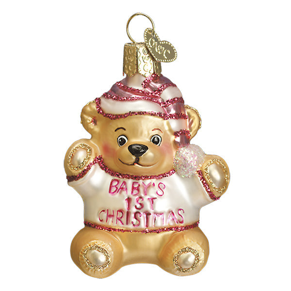 Baby Girl's First Teddy Bear glass ornament wearing a pink striped hat and white sweater.
