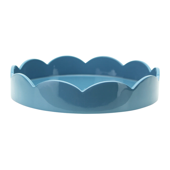 Small round scallop tray in chambray blue with a clean matte finish.