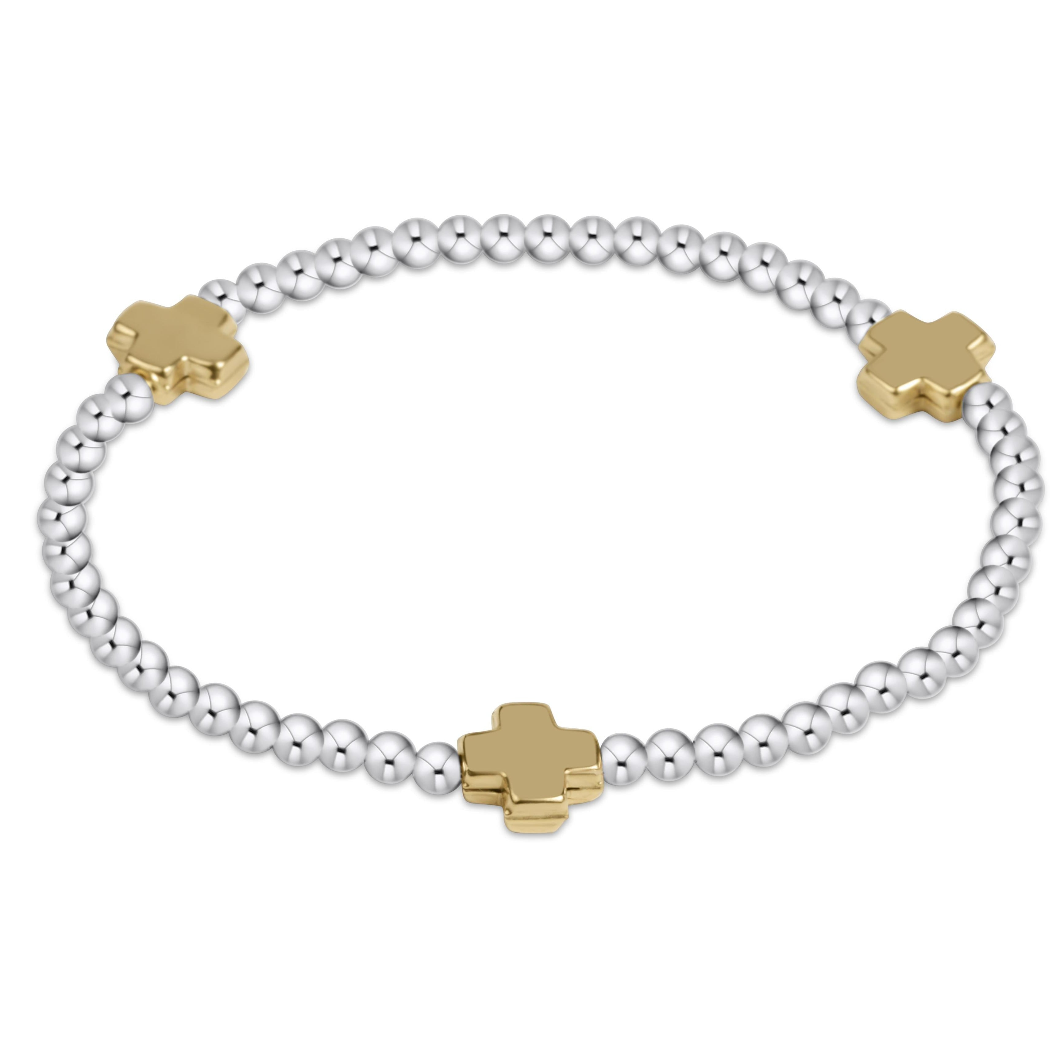 Silver beaded bracelet with three gold-filled signature crosses on a white background.