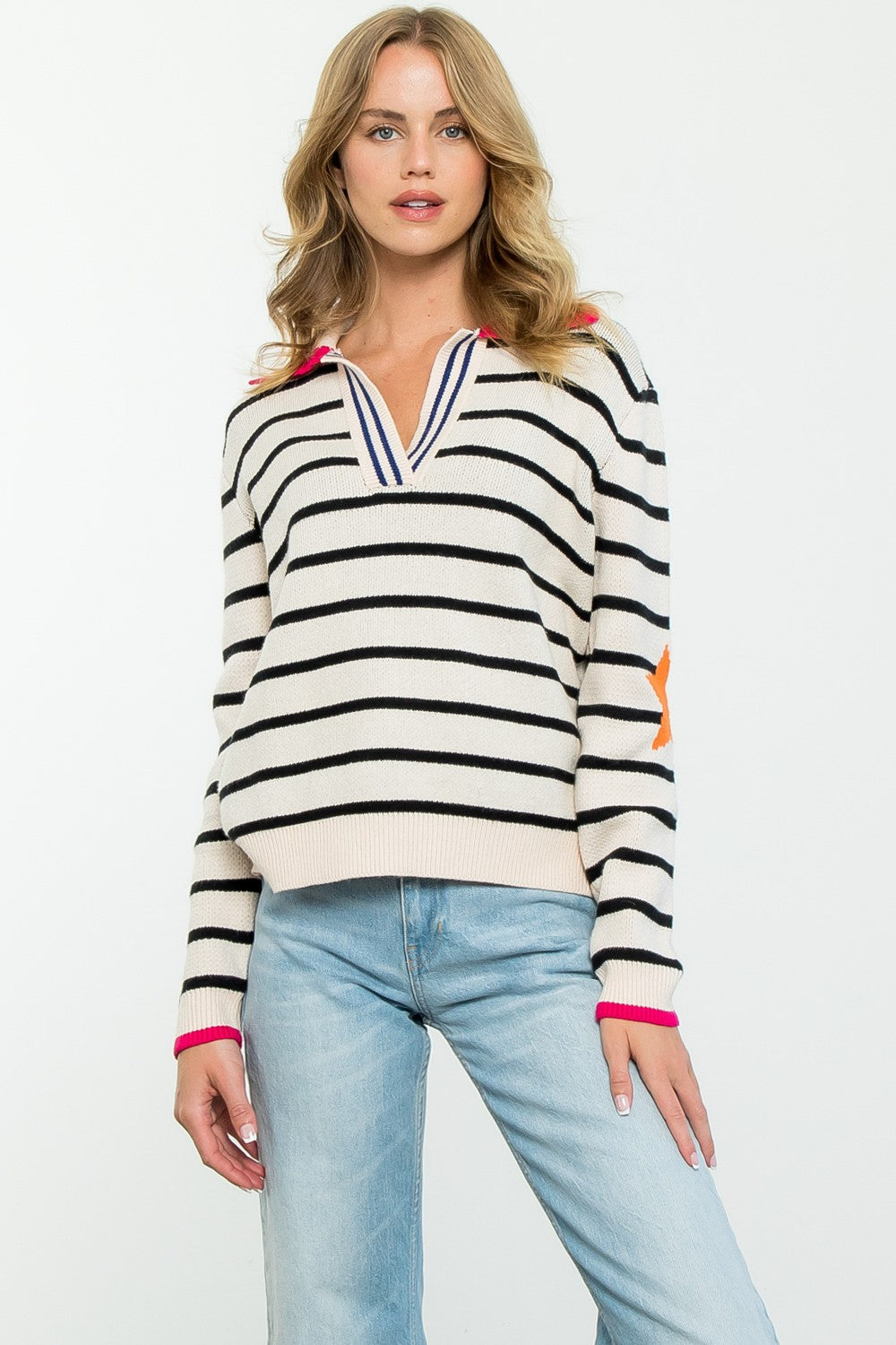 Lydia collared striped knit sweater in navy with white vertical stripes.