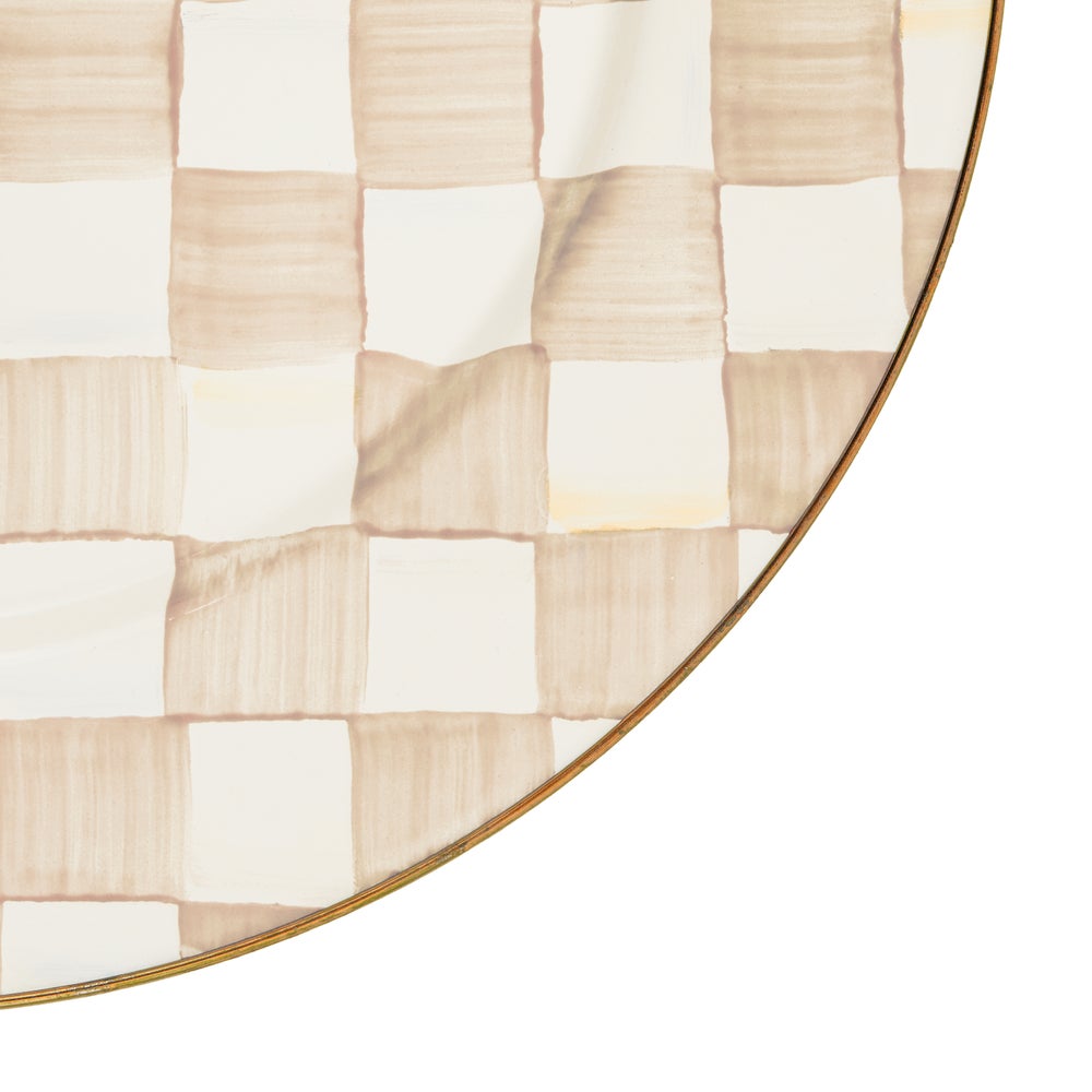 Mocha Check charger plate with hand-painted beige and white squares and a bronzed stainless rim.