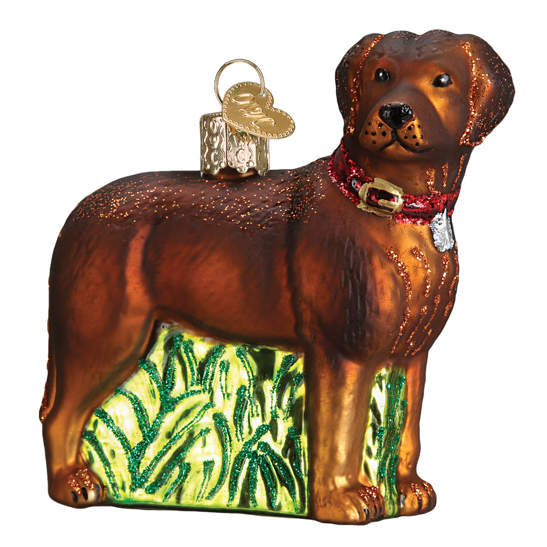 Standing Chocolate Lab glass ornament with a red collar and glittery green grass base.