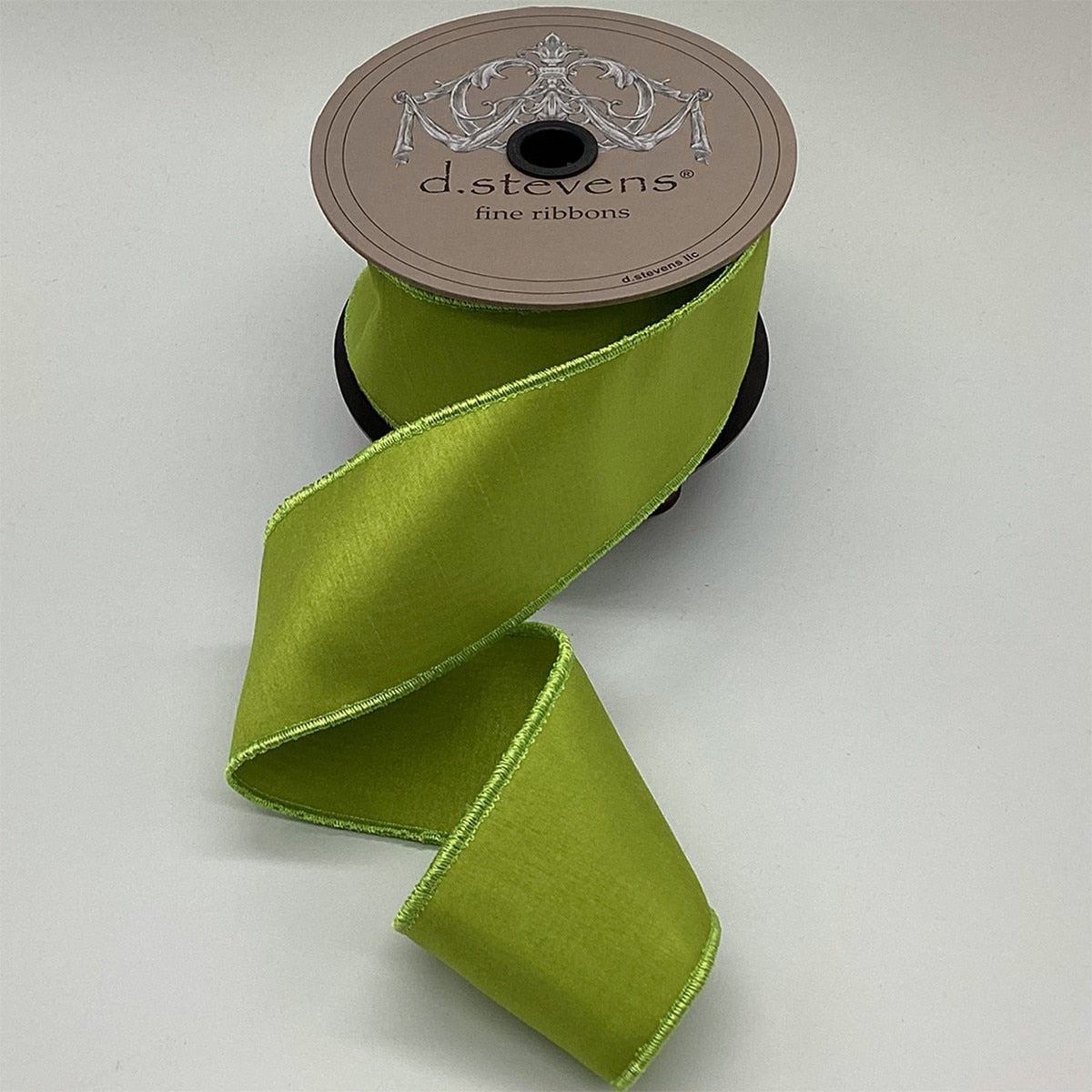 2.5 inch by 10 yard spool of lime green faux dupion ribbon with wired edges.