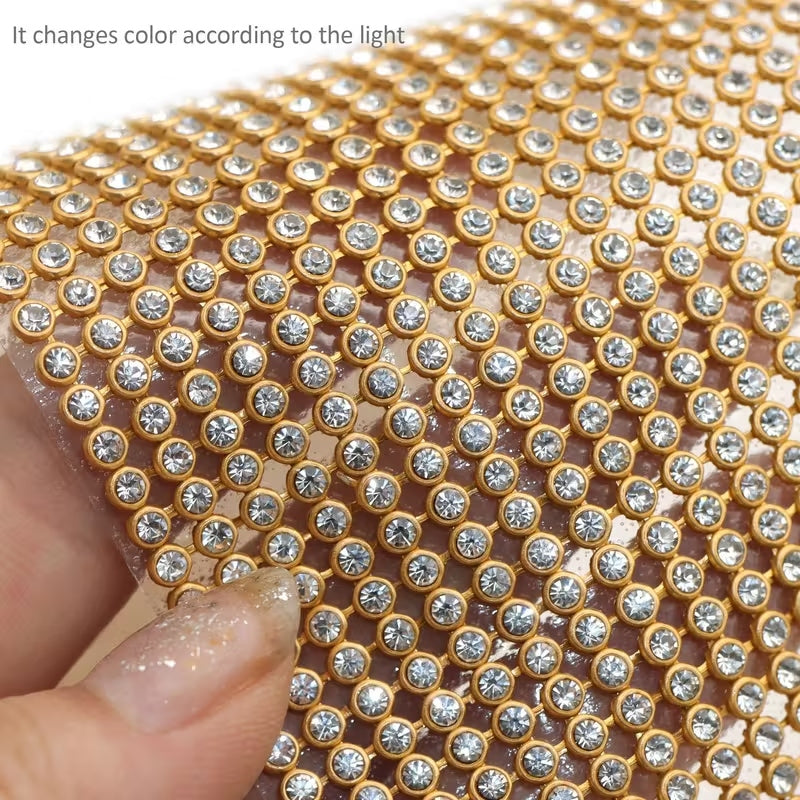 Elegant rhinestone mesh ribbon with a shimmering silver finish.