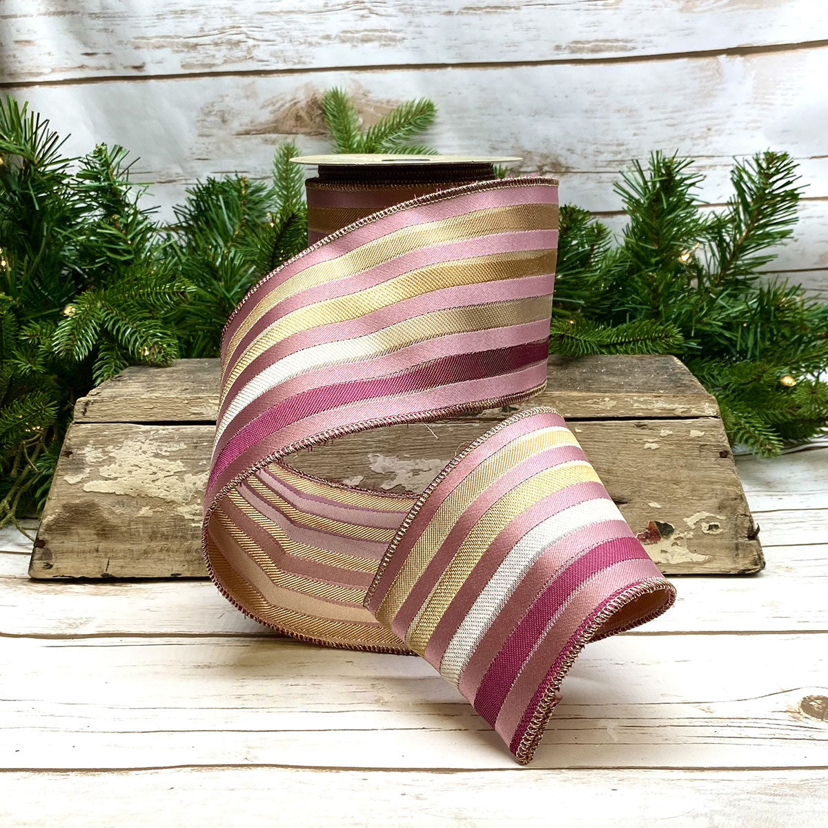 4-inch wide irregular stripe ribbon in raspberry, gold, and pink colors.
