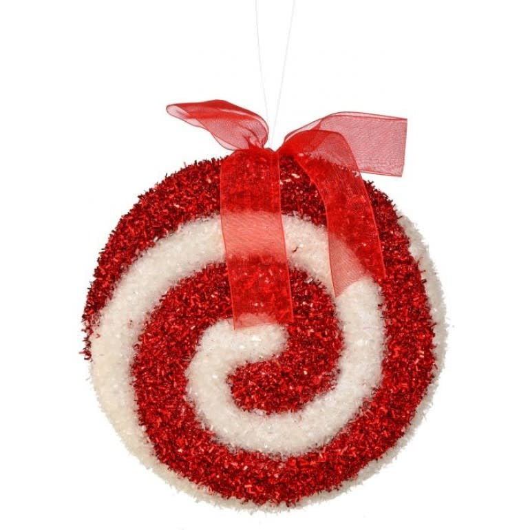 6-inch Christmas ornament with red and white candy swirl coating and a bow at the top.