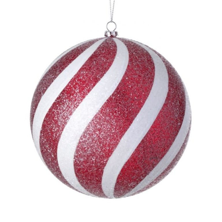 Red spherical ornament with white icing texture resembling an iced candy ball.