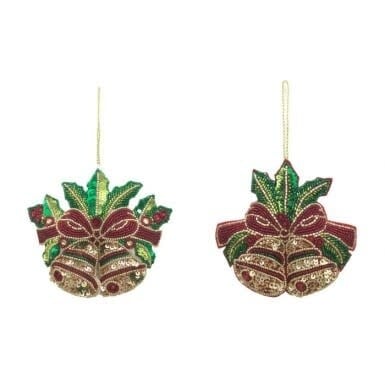 Red sequin bell ornament with gold bead accents hanging on a green Christmas tree branch.