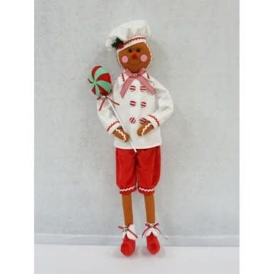 28-inch felt gingerbread chef doll wearing a white chef hat, jacket, and red shorts with a lollipop.
