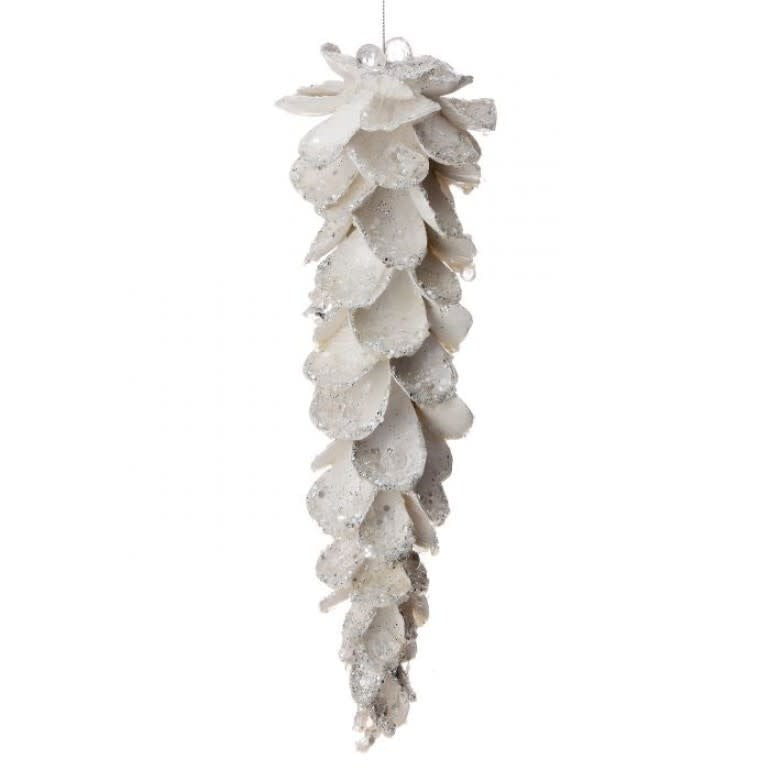 White glittery icicle ornament with layered petal-like scales hanging vertically.