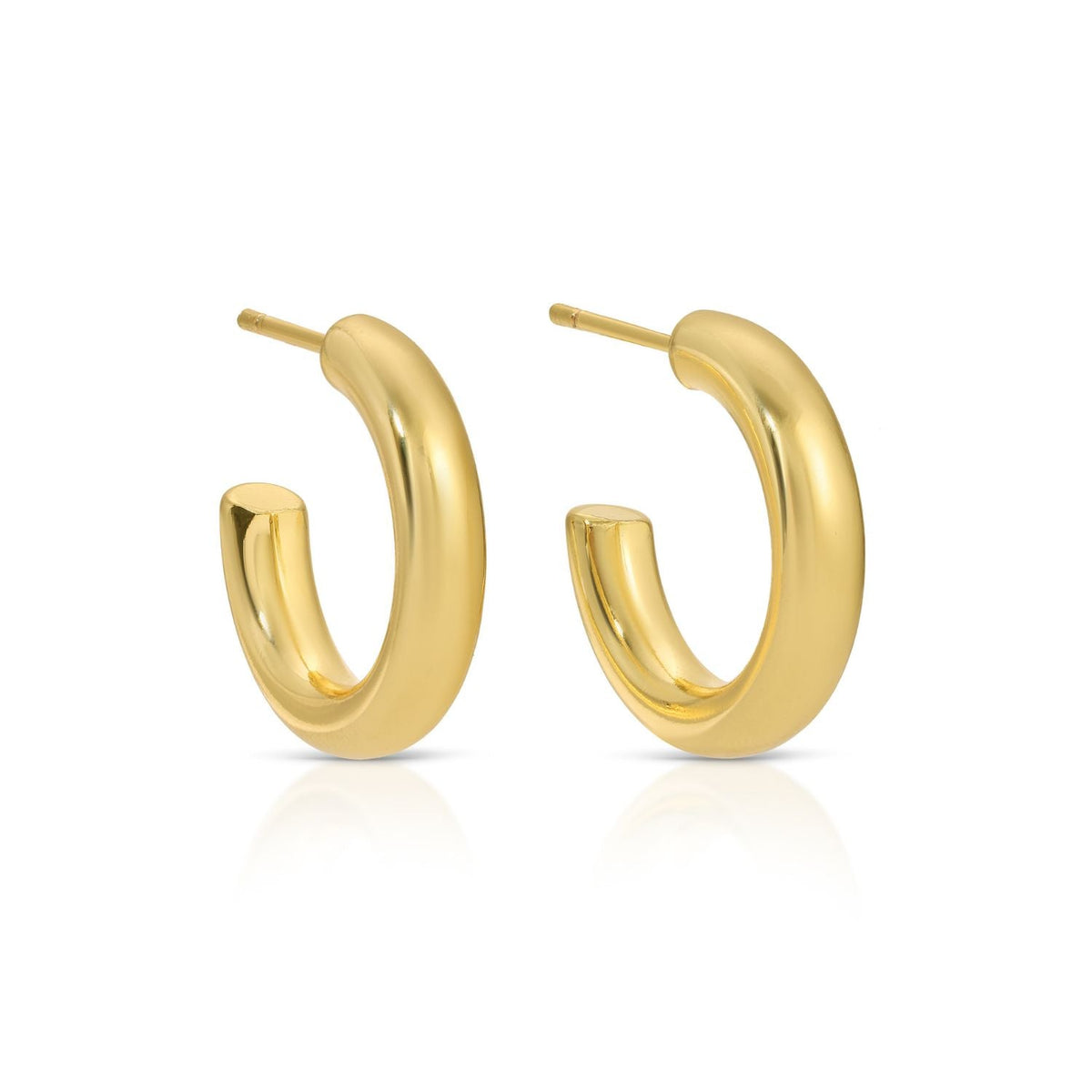 Brass hoop earrings with a polished finish displayed against a neutral background.
