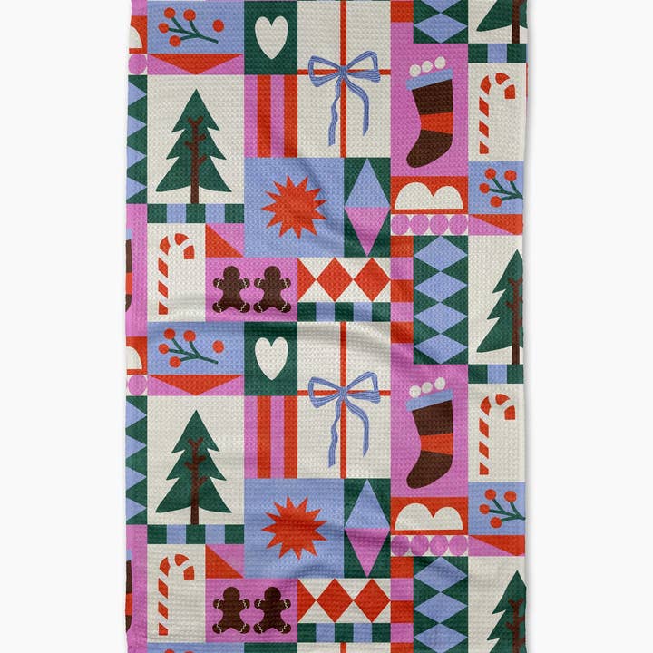 Holiday tea towel with waffle weave construction in red featuring a festive pattern