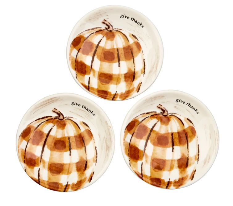 Round dolomite pumpkin dipping dish with a smooth beige finish.