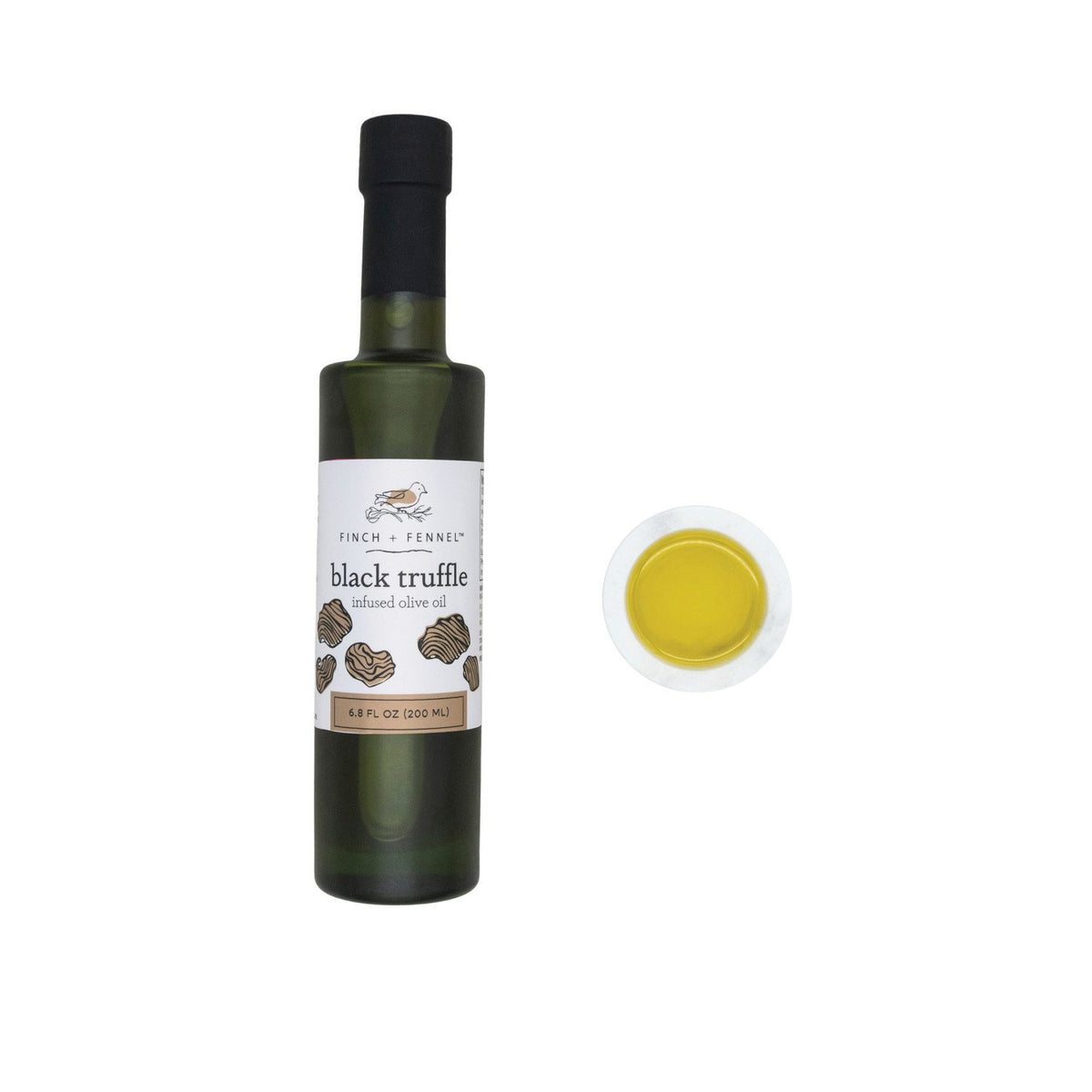 Bottle of black truffle infused olive oil with a dark liquid visible through clear glass.