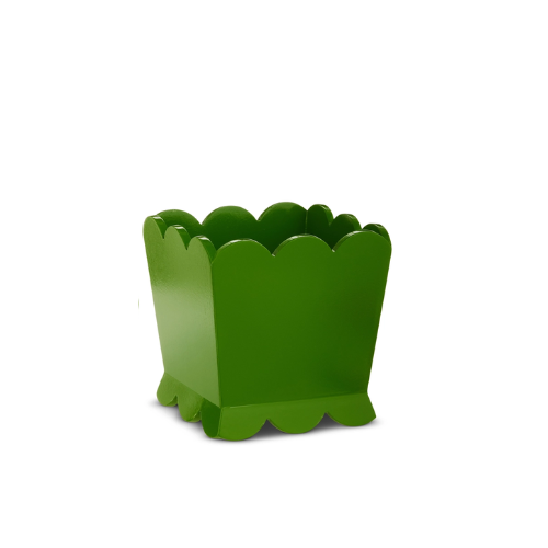 Large scalloped MDF planter in natural fiberboard color with decorative curved silhouette.