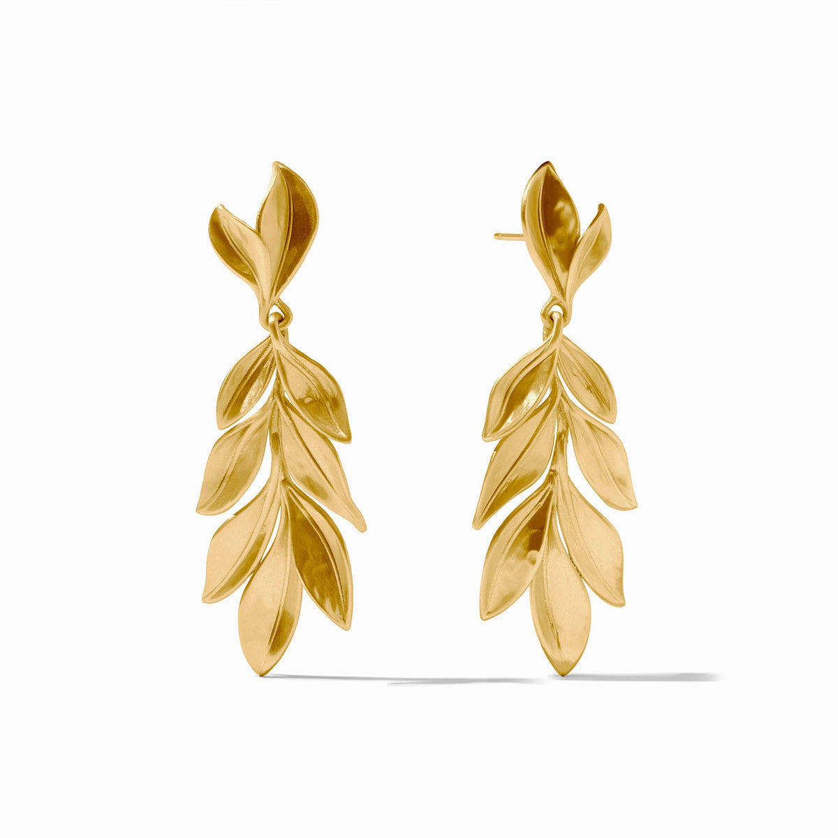 Willow Statement Earring in gold-tone metal with a curved willow branch silhouette and dangling leaf accents.