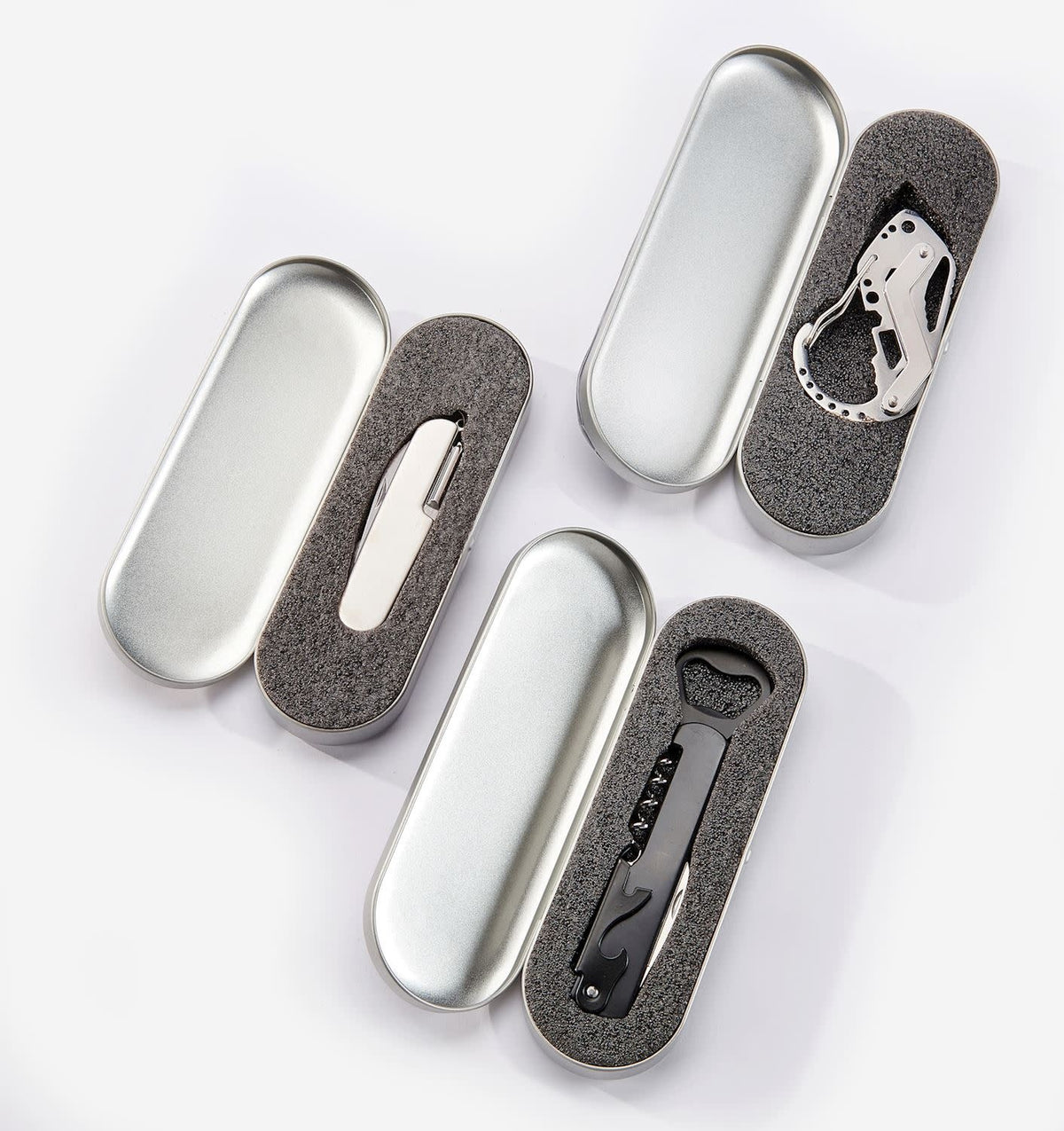 Stainless steel multi-function pocket tool with multiple utility functions in a sleek compact case.
