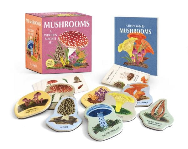 Wooden magnet set featuring illustrated mushroom silhouettes on a light background.
