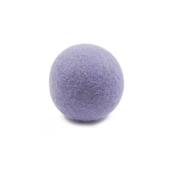 Single white eco dryer ball with smooth rounded shape.