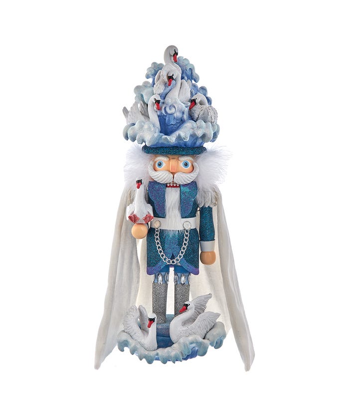 18-inch Hollywood Seven Swans Swimming Nutcracker in blue and white with swan-themed hat and base.