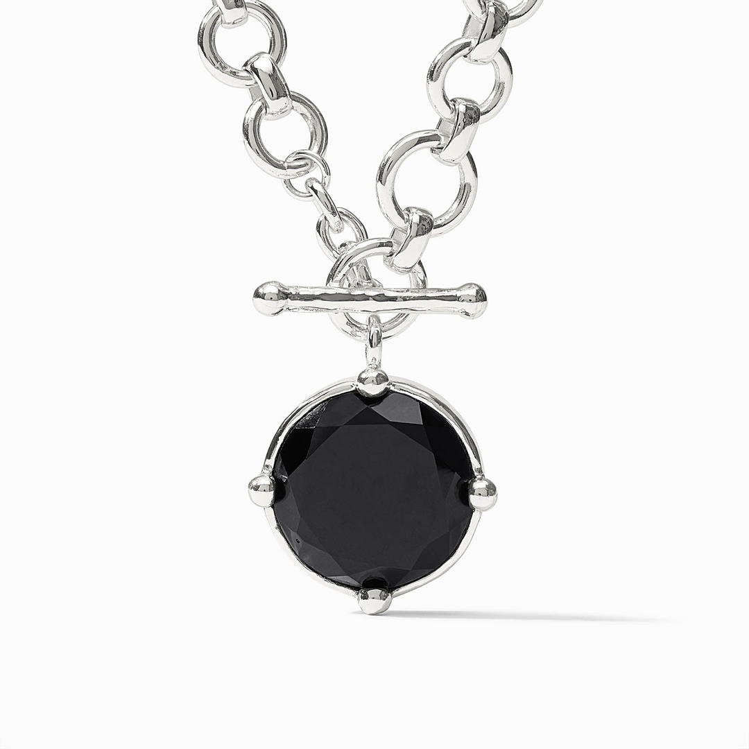 Honeybee Demi Necklace featuring a round rose cut black stone pendant on a silver link chain.