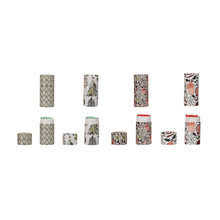Tube matchbox with seasonal pattern featuring red safety matches inside