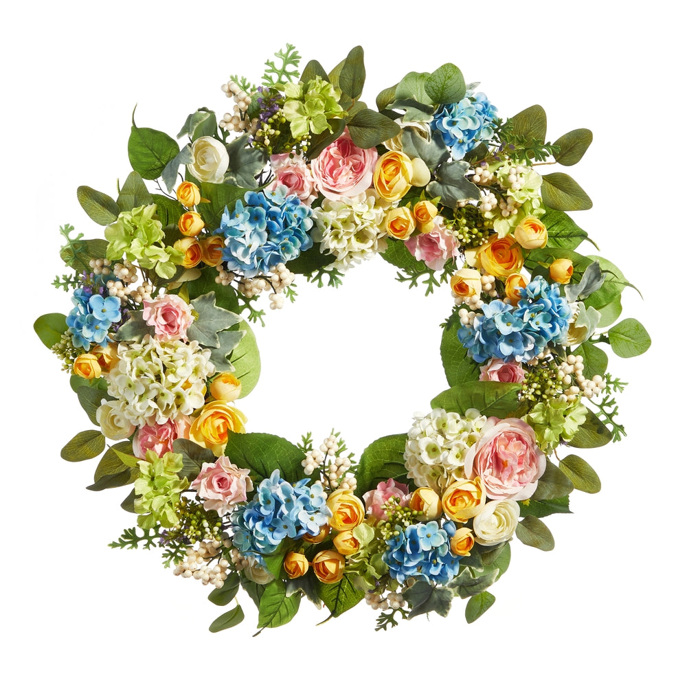 Round polyester wreath with mixed floral patterns in pastel colors measuring 26 inches wide.