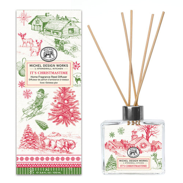 Home Fragrance Reed Diffuser with clear glass bottle containing light-colored liquid and multiple reed sticks.