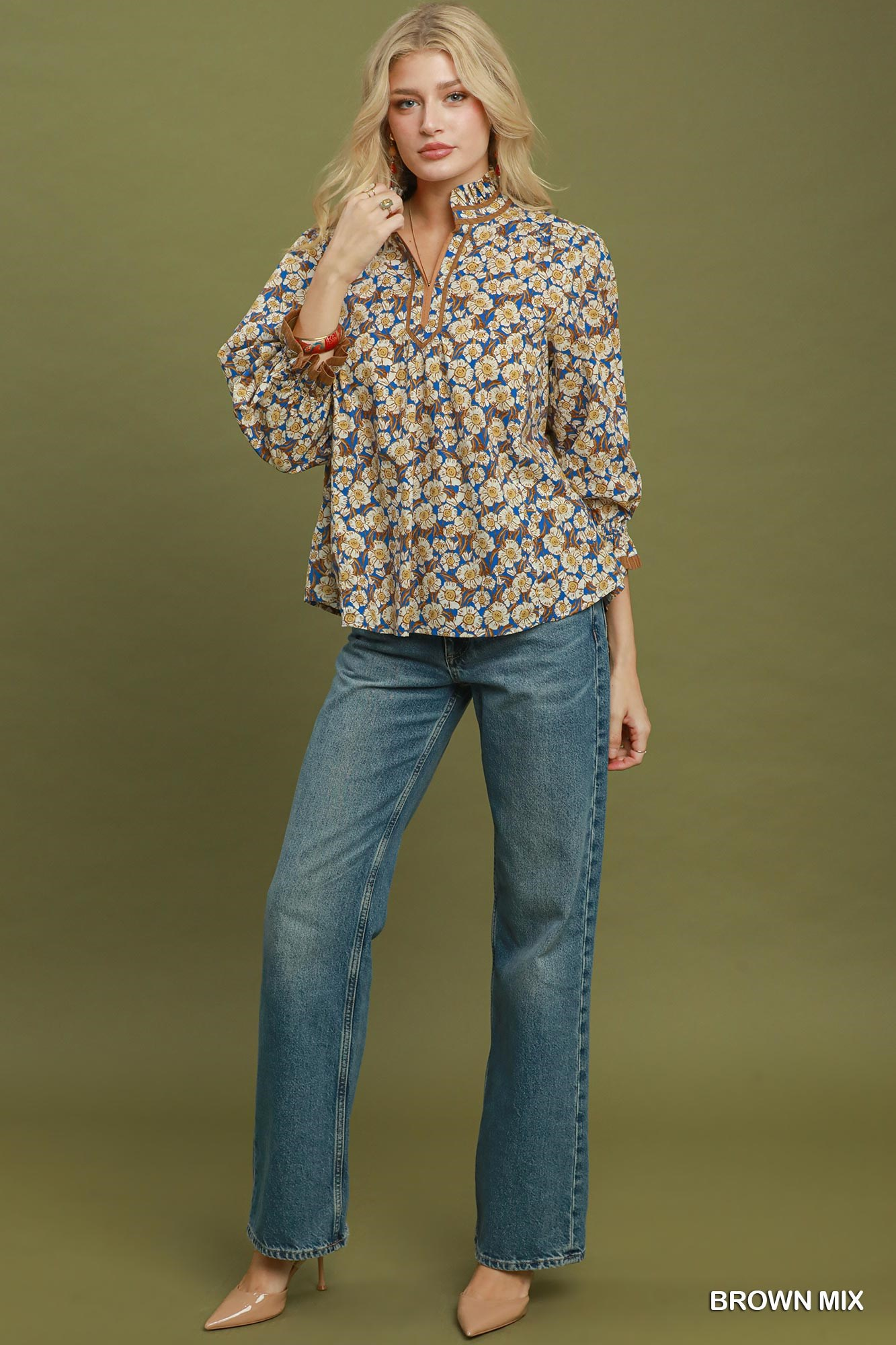 Woman wearing the Kate Mix Floral Print Mandarin Collar Blouse in brown mix with blue jeans.
