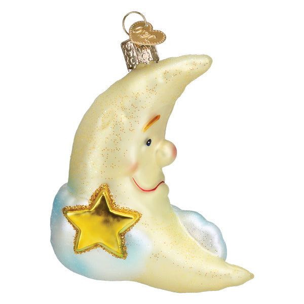 Mister Moon glass ornament featuring a smiling crescent moon with a gold star and glitter accents.