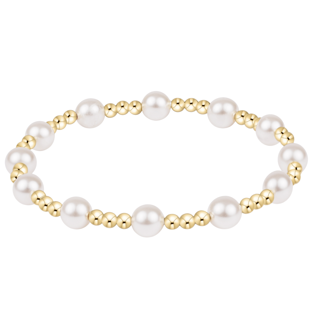 Extends Sincerity 6mm bracelet featuring white crystal pearls and 14kt gold-filled beads.