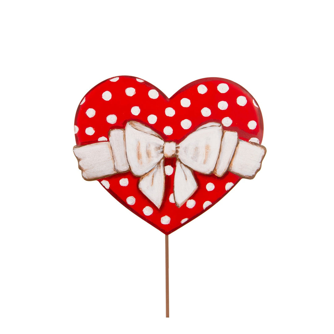 Medium stake heart with red polka dot pattern on white background