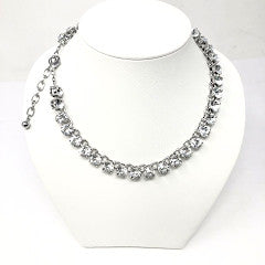 Silver tone tennis necklace with a classic link chain design.