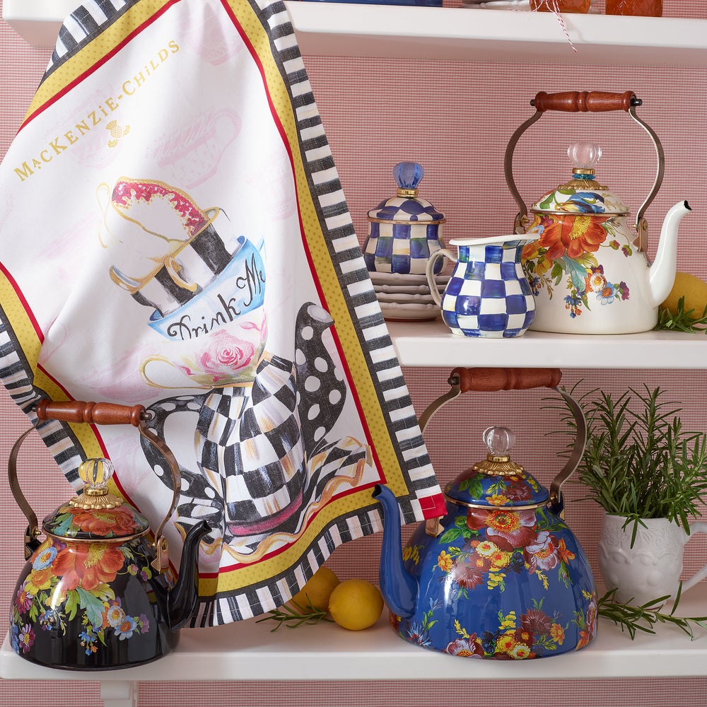 Royal Check Enamel Creamer with blue and white hand-painted checks on a kitchen shelf.