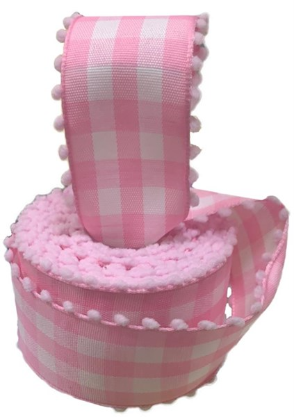 A spool of black checkered ribbon with white poms attached to the end.