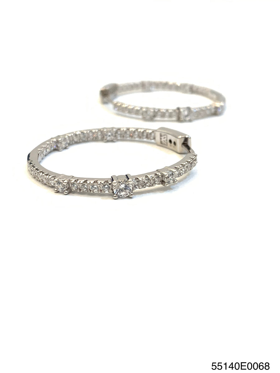 Lea Inside Out hoop earrings in black with a silver interior finish.